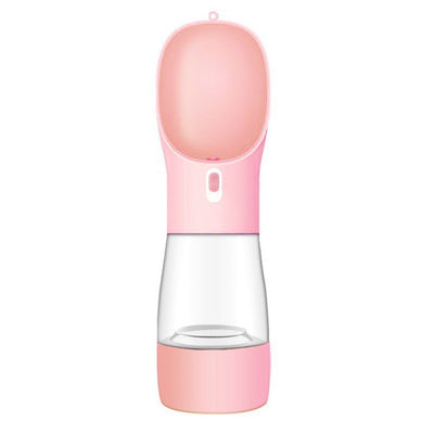 Pink portable pet water bottle with integrated feeder bowl, clear reservoir, and dispensing button for dogs. - Image 39