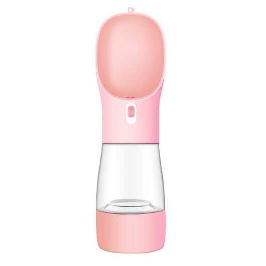 Pink portable pet water bottle with integrated feeder bowl, clear reservoir, and dispensing button for dogs. - Image 39
