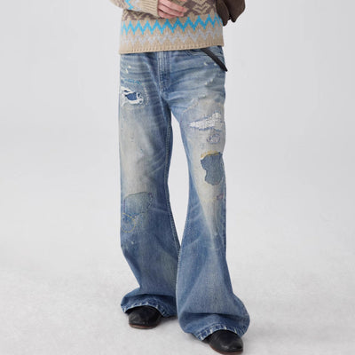 Jeans Acampanados Azul Lavado con Parches de Color