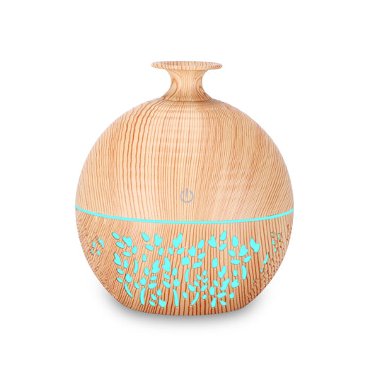 Light wood grain portable mini aroma diffuser humidifier with a vase shape and glowing blue leaf patterns. - Image 2