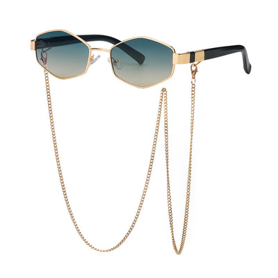 Women's hexagonal sunglasses with dark lenses, gold-colored metal frame, black temples, and a detachable gold chain. - Image 4