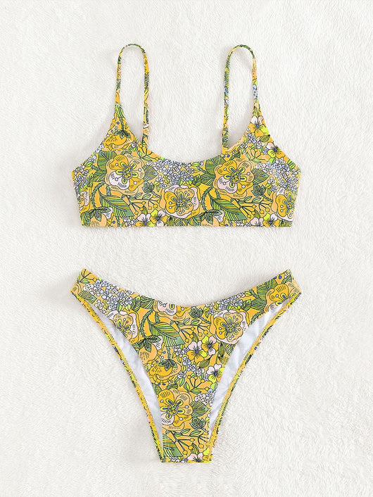 New printed bikini swimsuit with a vibrant floral pattern on a light blue background, featuring a scoop neck top and high-cut bottom. - Image 11