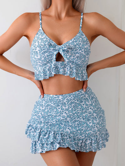 Women's blue and white floral print two-piece set with ruffled crop top and matching mini skirt. - Image 8