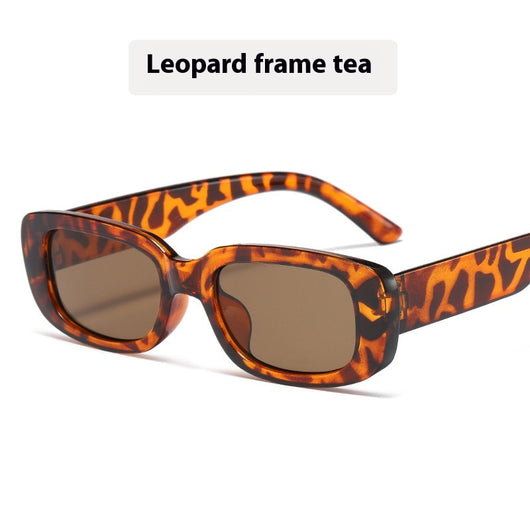 Children's small frame oval sunglasses with a solid white PC frame and brown AC lenses for UV protection. - Image 7