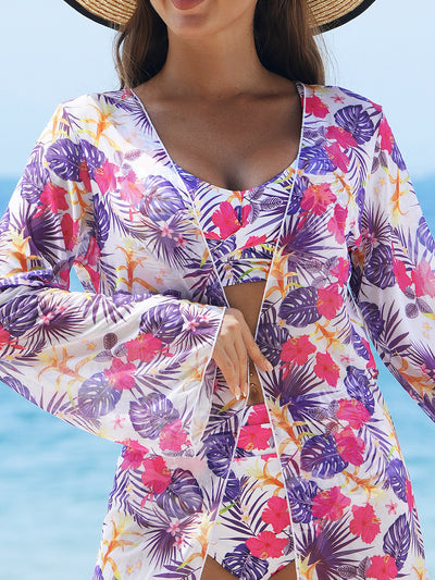 Multicolor tropical print three-piece swimsuit set with high-waisted bikini and sheer mesh cover-up on a beach. - Image 26