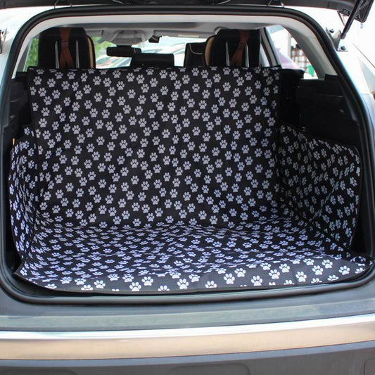 Black waterproof pet car mat with white paw print pattern covering the trunk and back of seats in an SUV. - Image 2