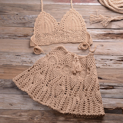 Light beige crochet bikini set with a halter crop top and a matching open-knit mini skirt with tassels. - Image 31