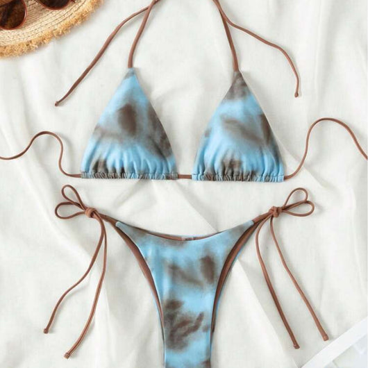 Women's two-piece bikini swimsuit with blue and neon yellow tie-dye pattern, featuring a triangle top and tie-side bottom.