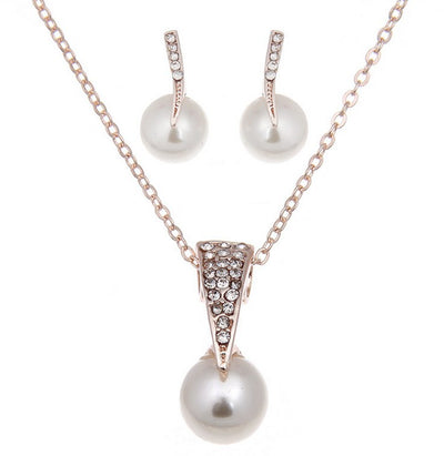 Rose gold-toned necklace and earring set with white pearls and clear rhinestones, ideal for bridal or formal wear. - Image 8