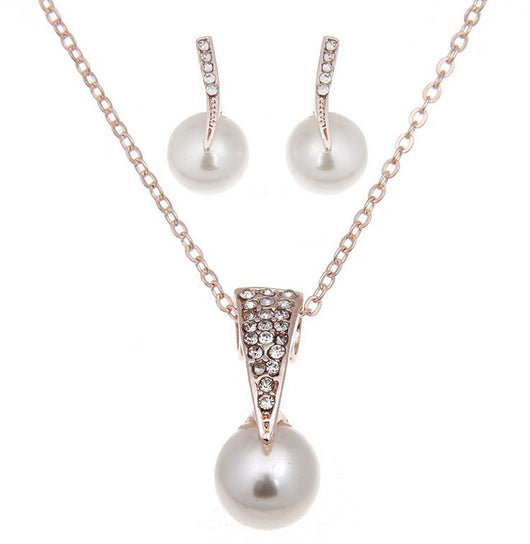 Rose gold-toned necklace and earring set with white pearls and clear rhinestones, ideal for bridal or formal wear. - Image 8