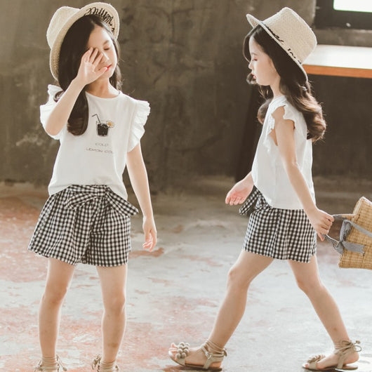 Conjunto Infantil Niña Estilo Coreano: Blusa Manga Corta y Short a Cuadros con Moño - Image 18
