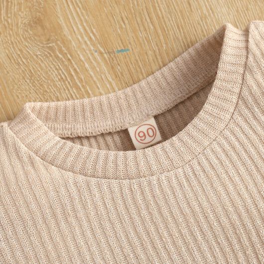 Conjunto Elegante: Blusa Tejida Manga Larga con Falda de Tirantes en Cuero - Image 15