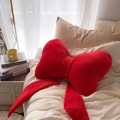 Almohada Decorativa con Lazo Rojo
