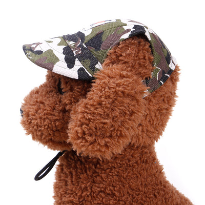 Orange pet baseball cap with ear holes and a curved brim, featuring a small patch with a dog graphic. - Image 3
