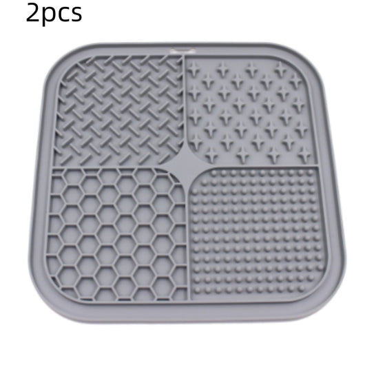 Gray silicone pet licking pad with four textured sections, designed for slow feeding and anti-choking. - Image 14