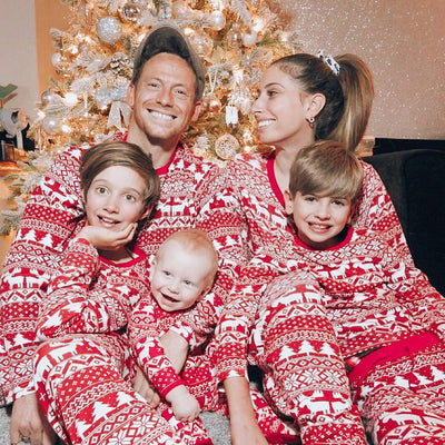 Red and white Christmas pajama set with long-sleeve top and pants, featuring a Fair Isle reindeer and tree print. - Image 13