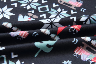 Dad's black long-sleeve pajama set with festive gnome and snowflake fair isle pattern, red trim. - Image 15