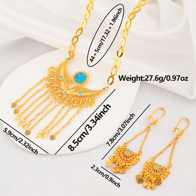 Gold-toned necklace and dangle earrings set with filigree water droplet design, turquoise accents, and tassel charms. - Image 13