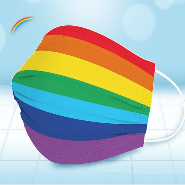 Five disposable face masks fanned out, each featuring a vibrant rainbow stripe pattern with white ear loops.