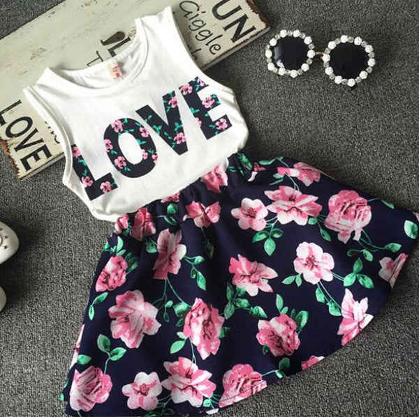 Conjunto de Dos Piezas para Niña: Chaleco Floral con Alfabeto y Falda Corta