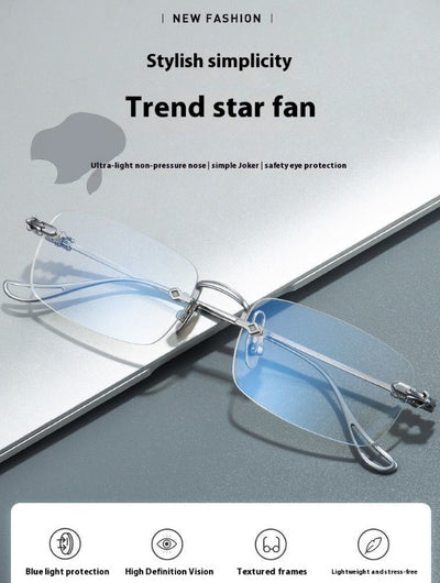 Silver rimless reading glasses with clear lenses held by a hand, featuring decorative temples and smart zoom technology. - Image 5
