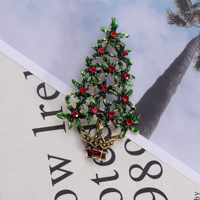 Broche Navideño de Árbol Dorado con Gotitas de Cristal