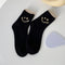 Contrasting black Smiley Style