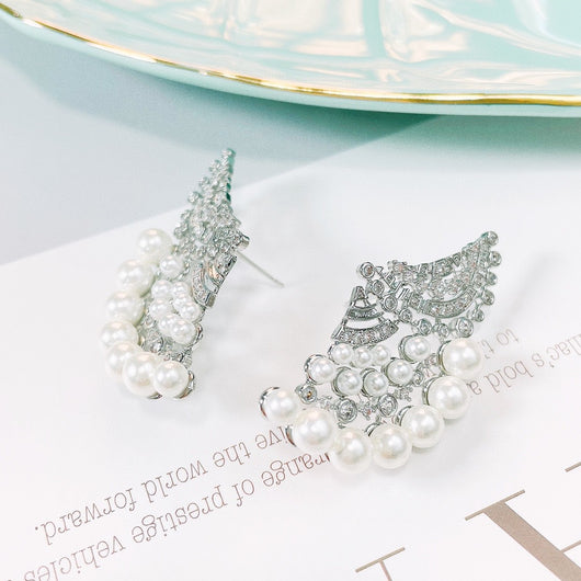Aretes de Perla Elegantes con Zirconia y Diseño Ondulado - Image 13