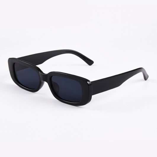 Rectangular tortoiseshell sunglasses with a small frame and dark gray lenses, angled on a white background. - Image 6