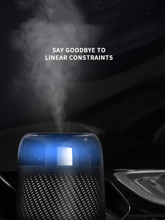Black car aroma diffuser humidifier with blue light, wireless charging, and automatic spray, shown with six essential oil bottles. - Image 5