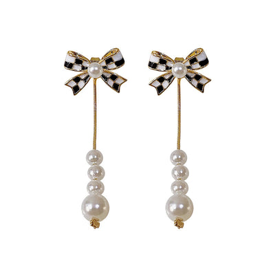 Aretes de Perla con Moño Elegante para Mujer - Image 4