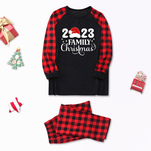 Red and black buffalo plaid Christmas pajama set with a long-sleeve top and matching pants. Top reads "2023 FAMILY Christmas". - Image 12
