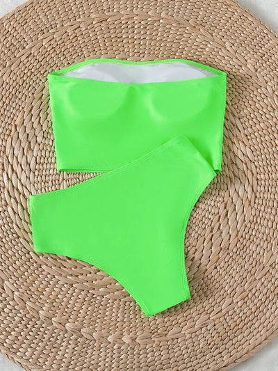 Vibrant orange strapless bandeau bikini top and high-waisted bottoms set, worn by a woman with a white shirt. - Image 18