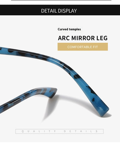 Black cat-eye anti-blue light reading glasses with green patterned temples on a white background. - Image 23