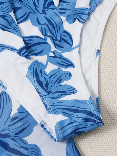 Women's pink floral print two-piece swimsuit with a tie-front crop top, high-waisted triangle bottoms, and matching sheer sarong. - Image 17