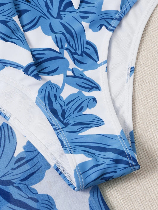 Women's pink floral print two-piece swimsuit with a tie-front crop top, high-waisted triangle bottoms, and matching sheer sarong. - Image 17