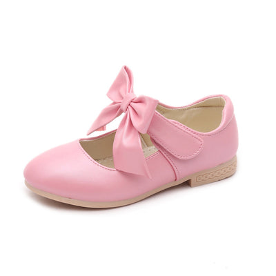 Gold Mary Jane shoes for girls with a large decorative bow on the strap and a low, comfortable heel. - Image 6