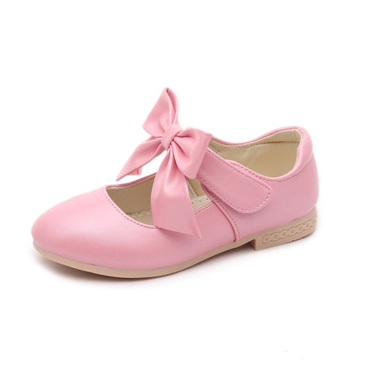 Gold Mary Jane shoes for girls with a large decorative bow on the strap and a low, comfortable heel. - Image 6