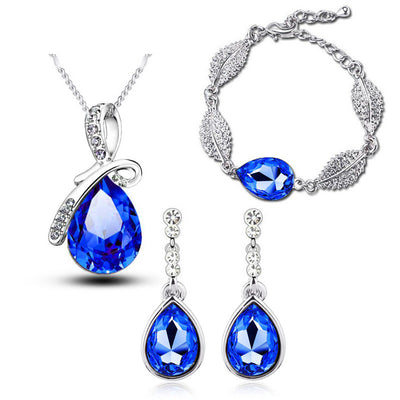 Set de Joyas Elegantes: Aretes Gota de Cristal, Collar Acacia y Pulsera - Image 10