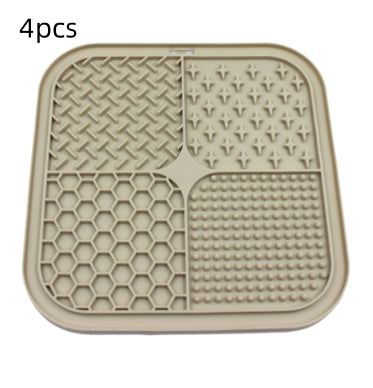 Gray silicone pet licking pad with four textured sections, designed for slow feeding and anti-choking. - Image 23