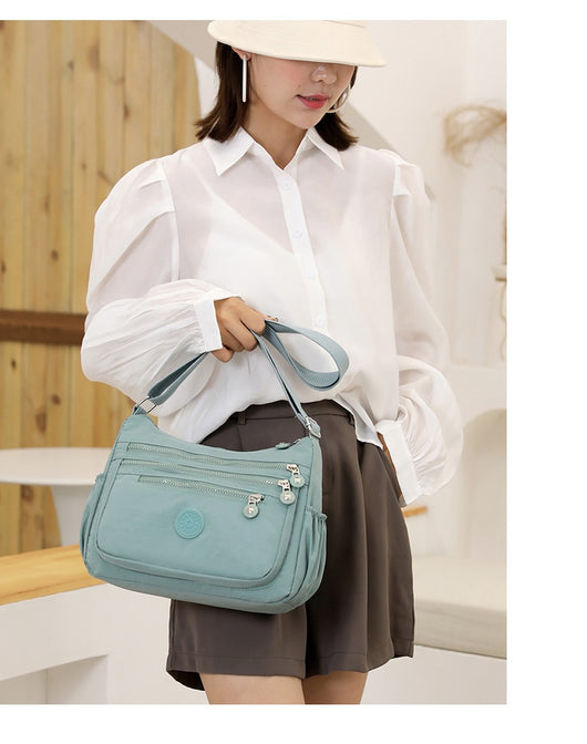 Bolsa Mensajera Unisex Nylon Ligera - Diseño Minimalista y Funcional - Image 33