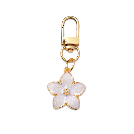 Dije Flor de Cerezo Iridiscente con Aceite Flotante - Accesorio Multiuso - Image 6