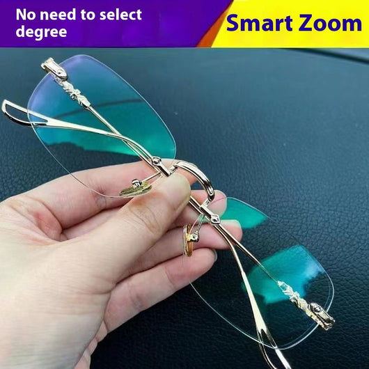 Silver rimless reading glasses with clear lenses held by a hand, featuring decorative temples and smart zoom technology. - Image 7