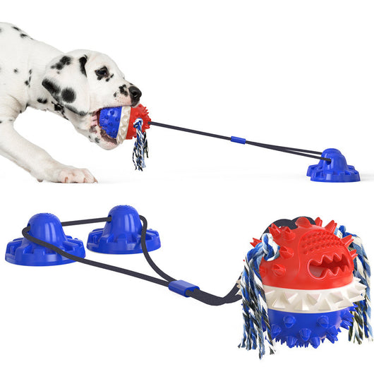 Red, white, and blue textured dog chew toy with rope tassels and a blue suction cup base, shown with a Dalmatian puppy playing. - Image 10