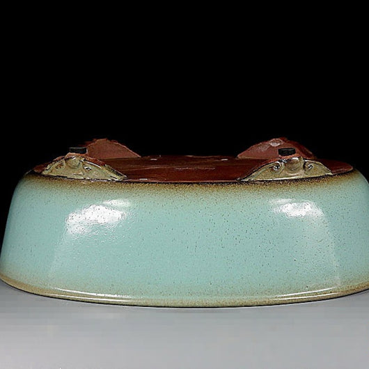 Maceta Ovalada Artesanal con Patas de Nube y Esmalte Verde Antiguo - Image 10