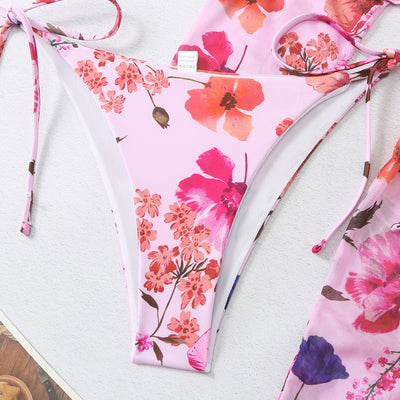 Milky white floral print three-piece swimsuit with triangle bikini top, v-cut bottom, and sheer long-sleeve cover-up. - Image 39