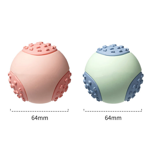 Mint green and blue rubber dog toy ball with textured nubs, measuring 64mm, for vocal and bite-resistant play. - Image 17