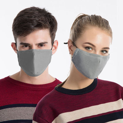 Young man wearing a black cotton face mask with adjustable ear loops, suitable for warmth and dust protection. - Image 8