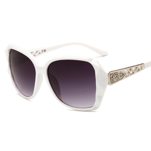 Women's retro big frame sunglasses with brown faceted frames, gradient purple lenses, and rhinestone-detailed silver temples. - Image 4