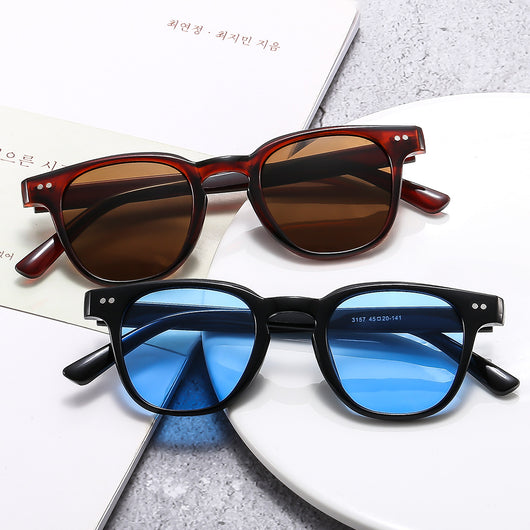 Brown square-frame sunglasses with brown lenses, suitable for sun protection and fashion wear.